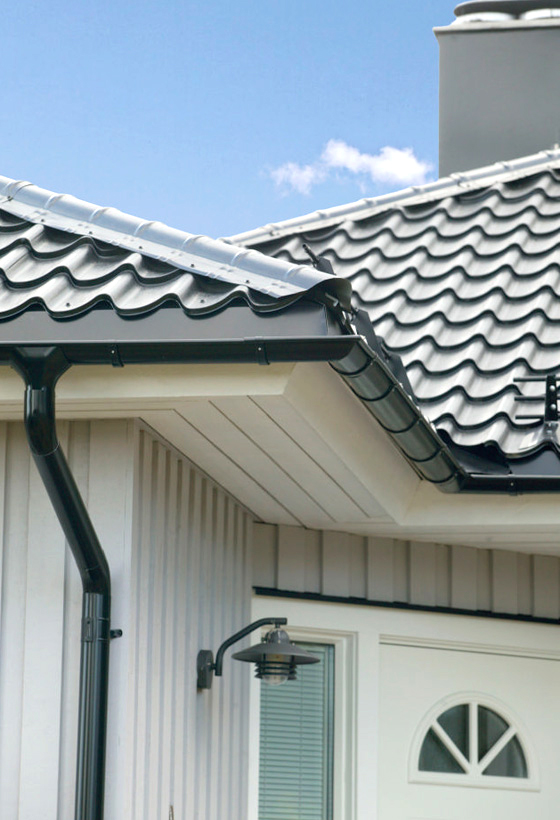 Building roof product with grey steel tiles