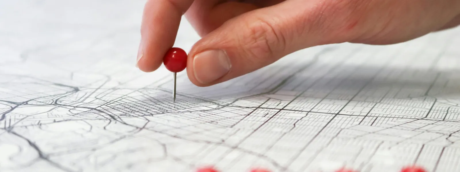 hand that pins location banner picture